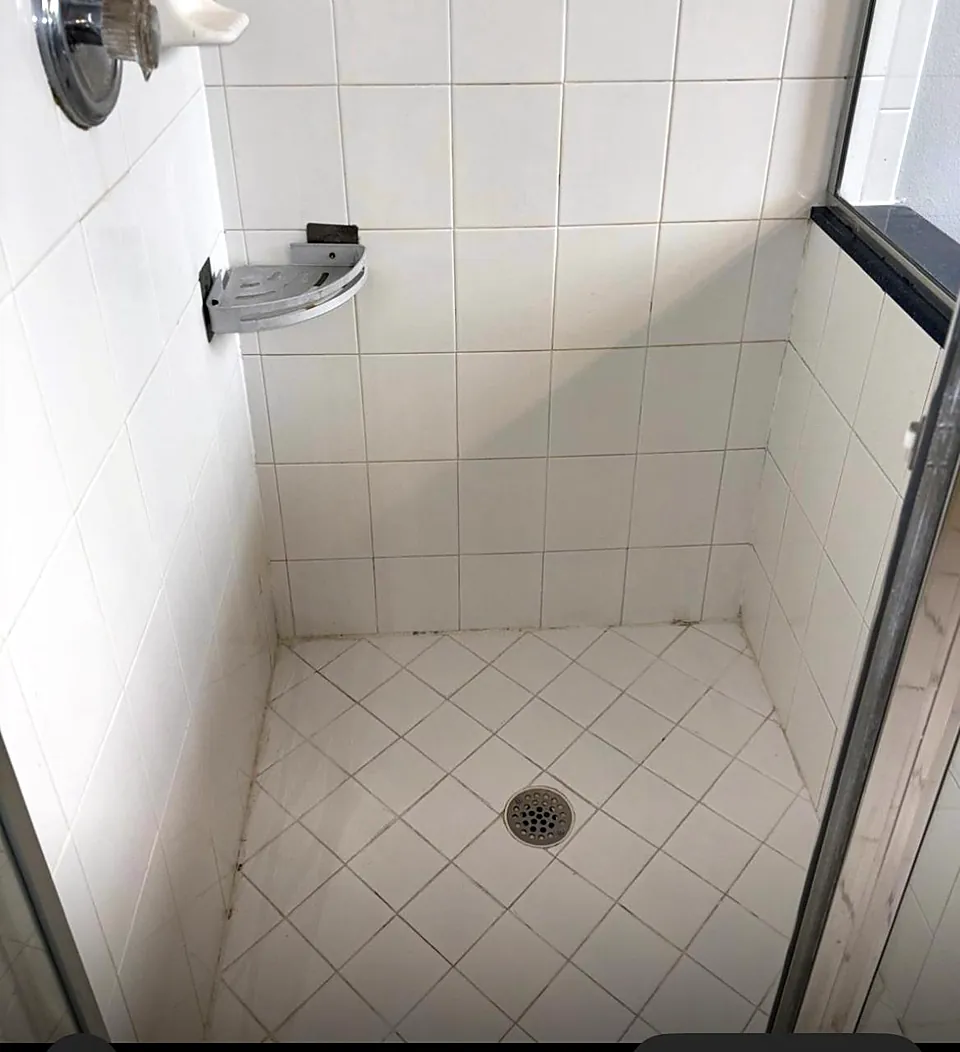 The same shower after a move-out cleaning